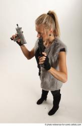 NIKOL STANDING POSE WITH TWO GUNS